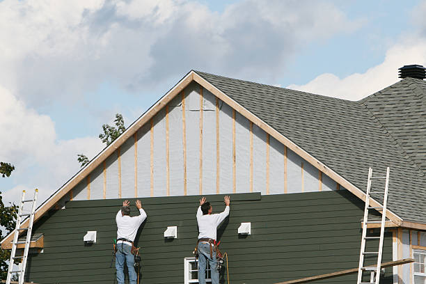 Professional Emergency Siding Repair technician working in Garrett, TX